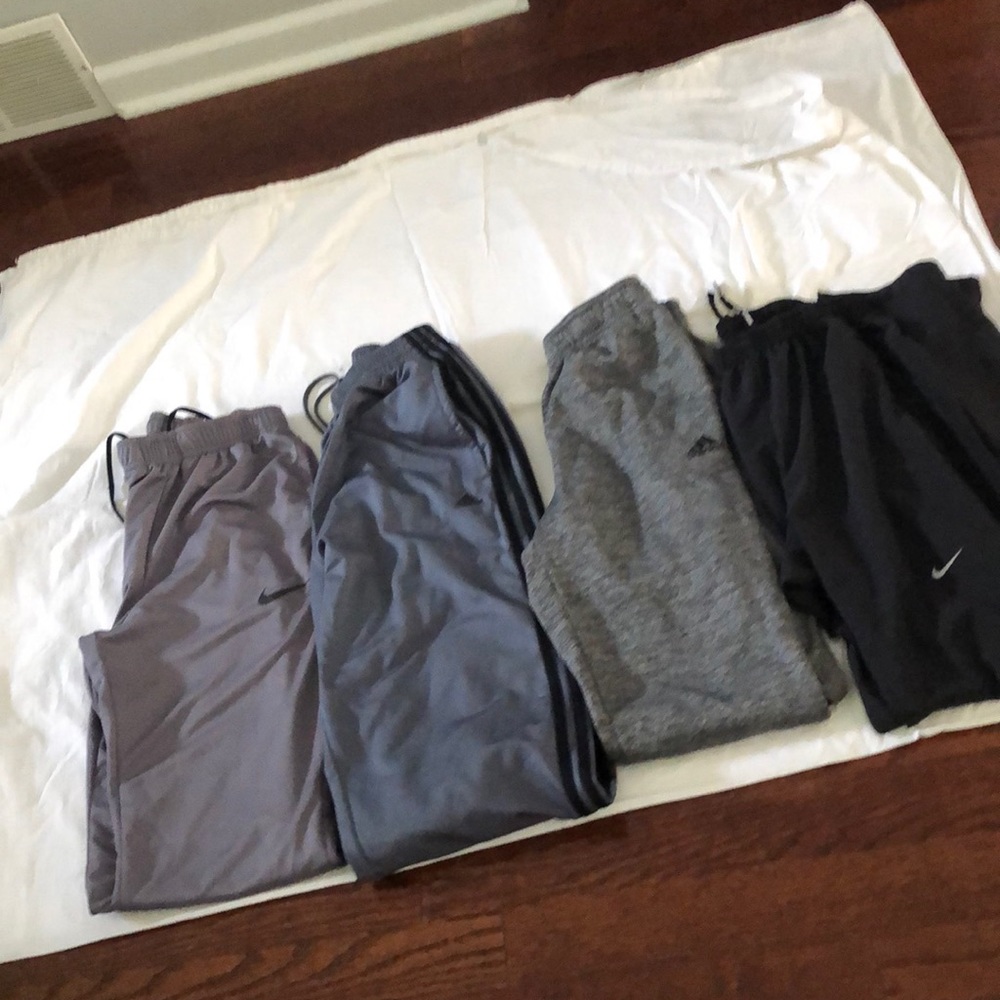 4 Pair of men’s small athletic sweatpants